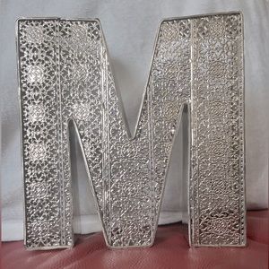 Silver M letter great for offices or kids rooms! Easy to hang!